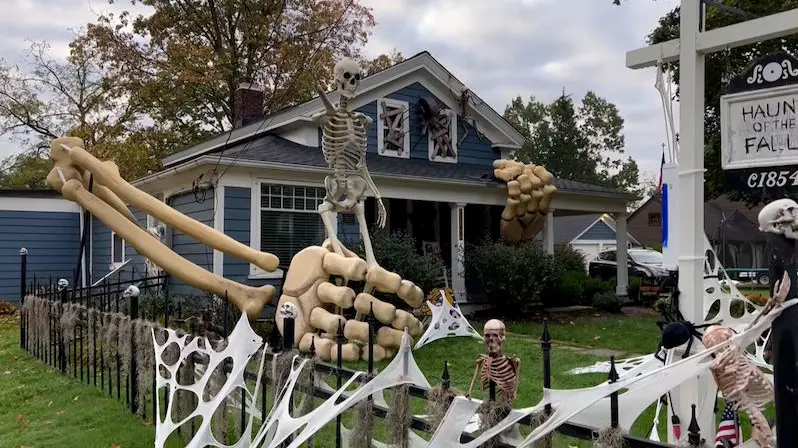 When giant skeleton hands hug the house